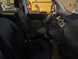 a picture of the inside of a car with black seats