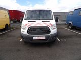 a white van that is parked in a parking lot