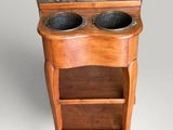 an image of a wooden cabinet with two bowls on top of it