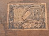 an old picture of a map on a piece of wood