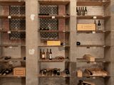 many bottles of wine on the shelves in the room