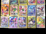 a lot of pokemon cards on a black background