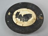 a black and white plate with a picture of a cat on it