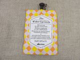 a sign that says the wake up circle on the back of a bag