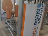 an image of a gym area with a bar and exercise equipment