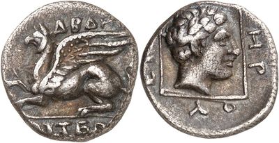 a silver coin with an image of a man on it