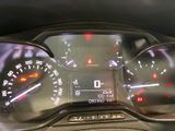 a close up of a car dashboard with a speedometer