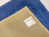 an image of a close up of a piece of cloth with a label on it