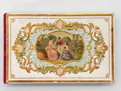 une boîte sur laquelle figure l'image d'une femme et d'un enfant