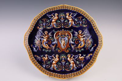 an image of a decorative plate with angels on it