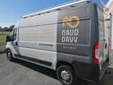 a van that is parked on the side of the road