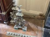 a small christmas tree on the floor in the corner of a room