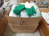 a box of gloves and gloves sitting on a table
