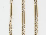 gold filled chain with a clasp on a white background