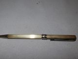 a pen that is laying on a table