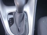 a close up of a car ' s gear lever in the center console