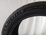 an image of a tire on a white surface with a white background