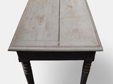 a small table with a wooden top on a white background