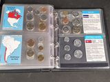a binder with a lot of coins inside of it