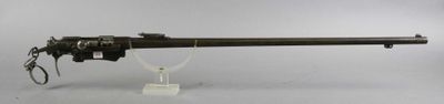 an image of a gun that is on a stand