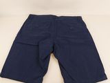 a photo of a pair of blue shorts on a white surface