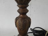 a lamp that is sitting on a table with a cord