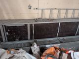 an image of a room with a bunch of bags of trash