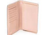 the pink leather wallet is open on a white surface