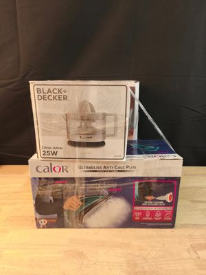 Lot de 3 articles : un presse agrume BLACK+DECKER, un fer à …