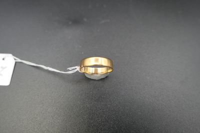 a close up of a ring on a string with a price tag