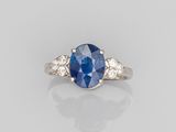a sapphire and diamond three stone ring
