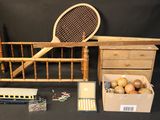 a wooden bed with a tennis racket on top of it