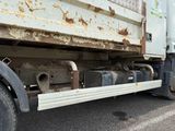 a truck that is parked on the side of the road