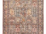 an antique persian rug with a multicolored design