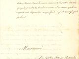 un vieux document écrit posé sur une table