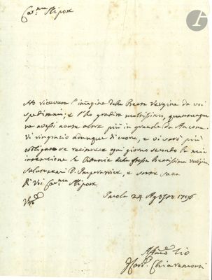 une vieille lettre manuscrite écrite à l'encre noire sur un morceau de papier