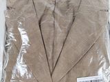 a piece of clothing wrapped in plastic on a table