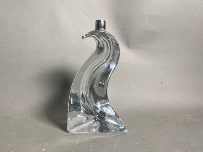 an image of a glass sculpture of a bird on a white background