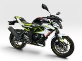 the white and green motorcycle is parked on a white surface