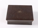 an image of a brown box sitting on top of a white surface