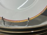 several plates stacked on top of each other on a table