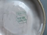 a close up of a bowl with a label on it