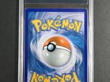 a close up of a pokemon card in a plastic case