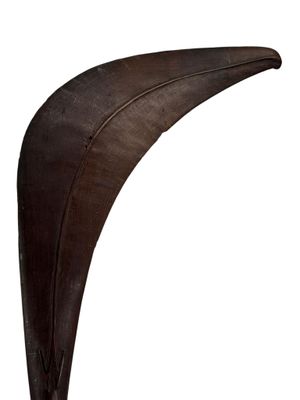 an image of a wooden sculpture of a bird ' s head