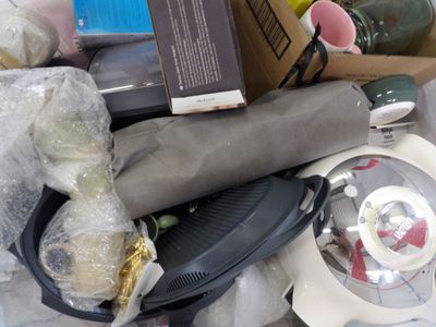 a pile of assorted items sitting on top of a table