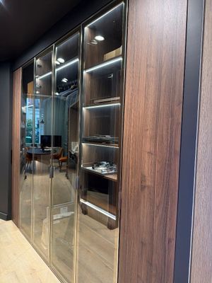a large glass door in the middle of a room