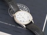 a watch that is sitting on top of a book
