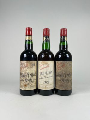 three bottles of wine sitting next to each other on a table