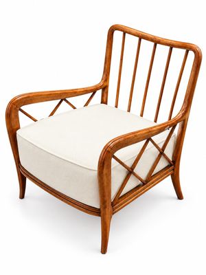 une image représentant une chaise sur laquelle est posé un coussin blanc