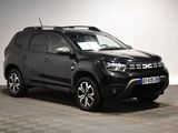 the new dacia is parked in a large room with checkered flooring